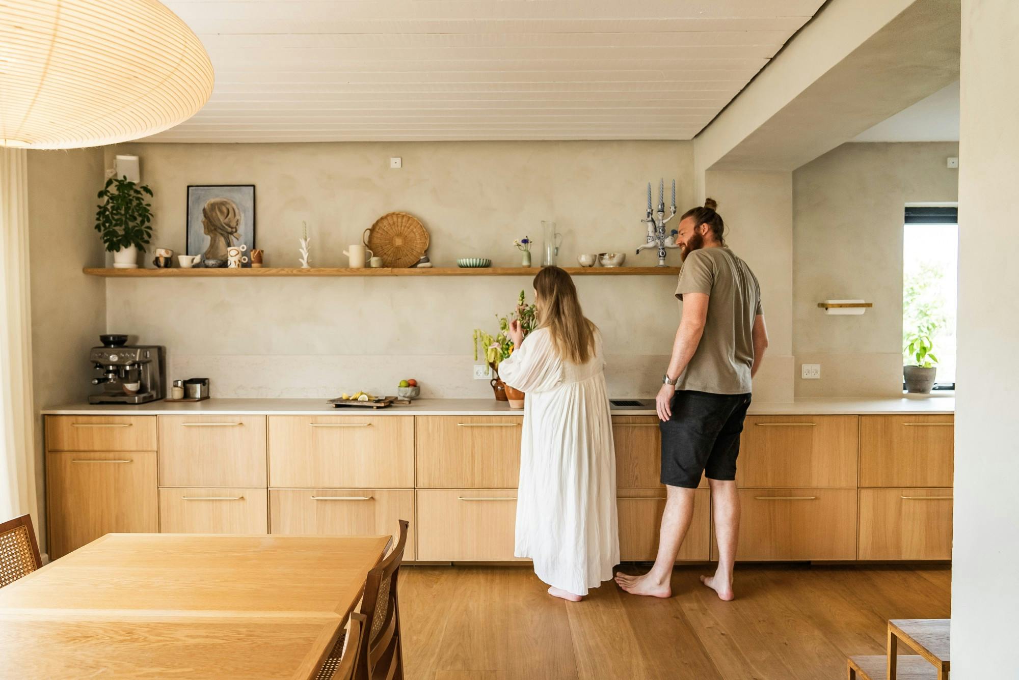 Image 41 of DSC7001.jpg?auto=format%2Ccompress&ixlib=php 3.3 in Dekton Bergen engages in dialogue with wood in this minimalist and timeless kitchen - Cosentino