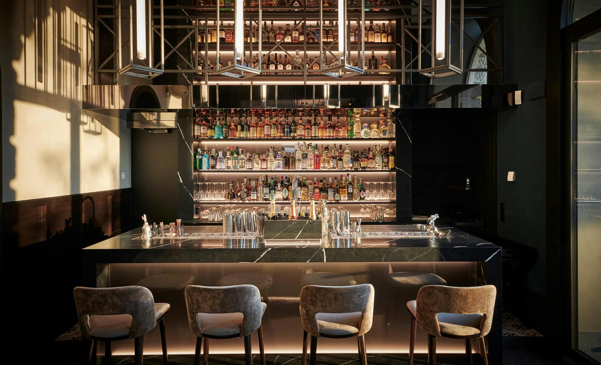 Image 34 of bar am wasser referenz QUER kueng schreinerei emmen 28.jpg?auto=format%2Ccompress&ixlib=php 3.3 in The second and glamorous life of the La Bastide Bourrelly Hotel thanks to an elegant renovation with Dekton and Silestone materials - Cosentino
