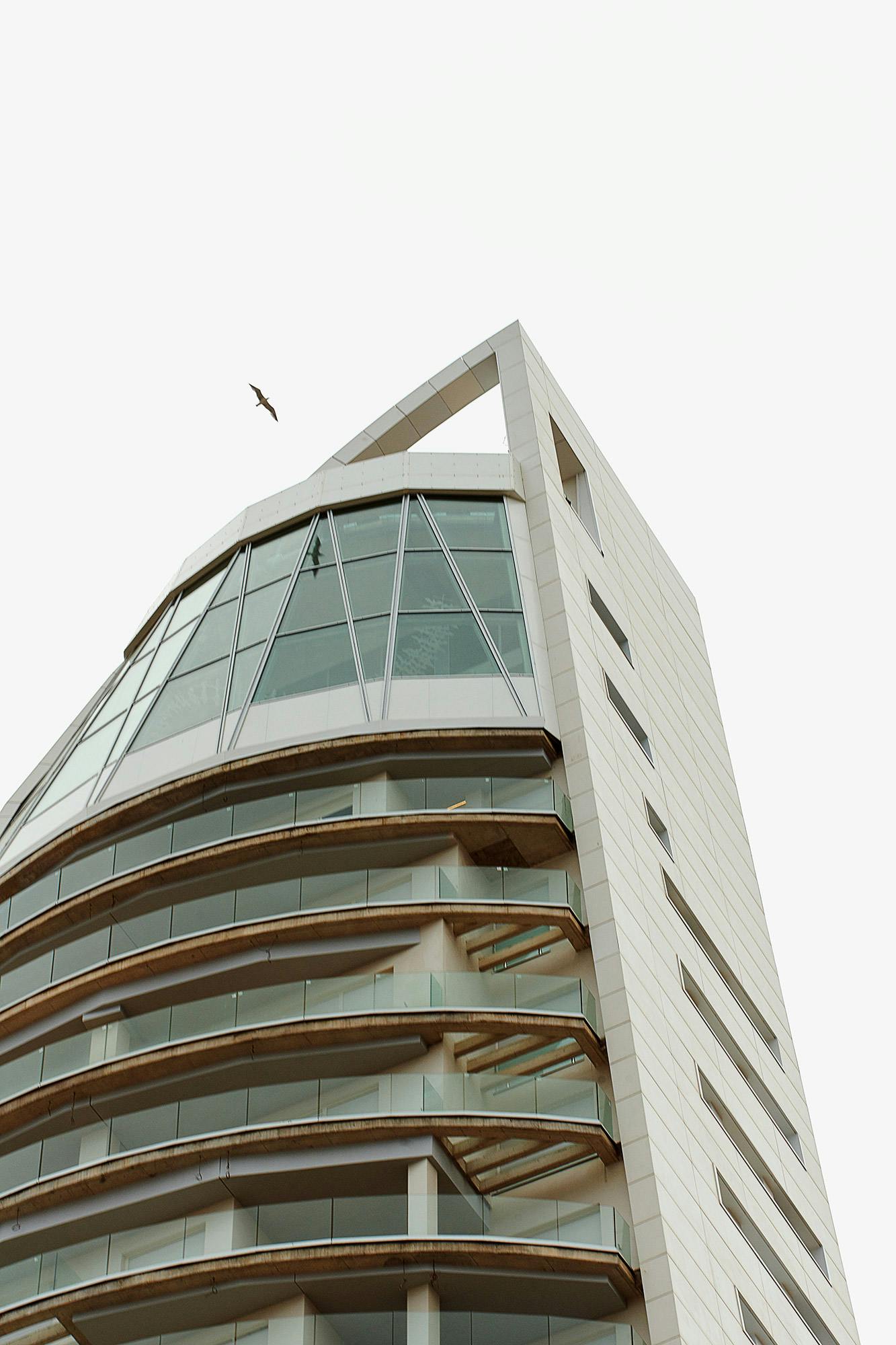 Image 38 of delfin tower benidorm 3.jpg?auto=format%2Ccompress&ixlib=php 3.3 in Dekton presents the world’s first curved and ventilated façade made of ultra-compact stone - Cosentino