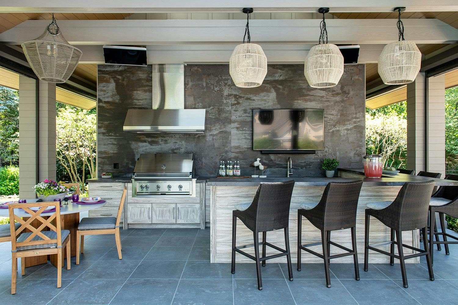 Image 38 of Riverwoods outdoor kitchen 5.jpg?auto=format%2Ccompress&ixlib=php 3.3 in Dekton is part of a lovely outdoor kitchen in Norway thanks to its exceptional durability and resistance - Cosentino