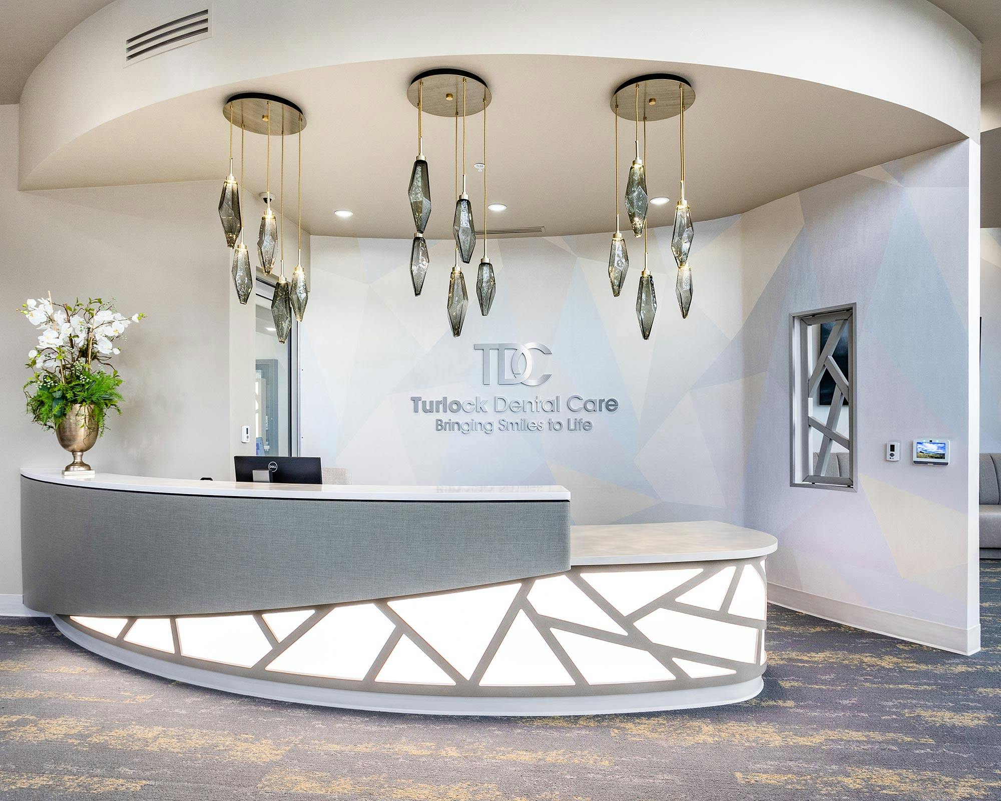 Image 45 of Turlock Dental Care 4.jpg?auto=format%2Ccompress&ixlib=php 3.3 in Scalea brings a touch of elegance to the bar area of a professional office - Cosentino