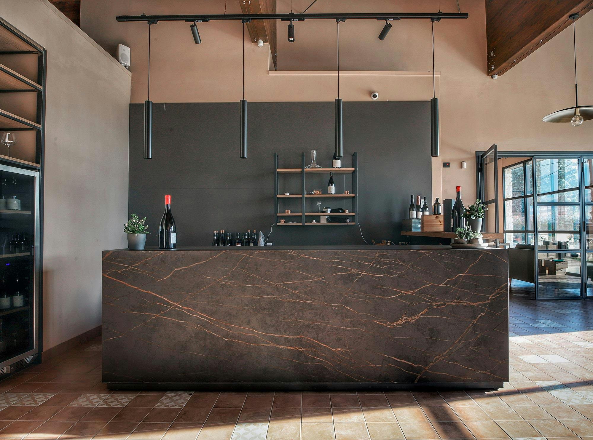 Image 46 of Claudio Cipressis Winery.jpg?auto=format%2Ccompress&ixlib=php 3.3 in Dekton Bromo, the perfect hard-wearing solution for the tables of an Irori-style Japanese restaurant in the city of Jakarta - Cosentino