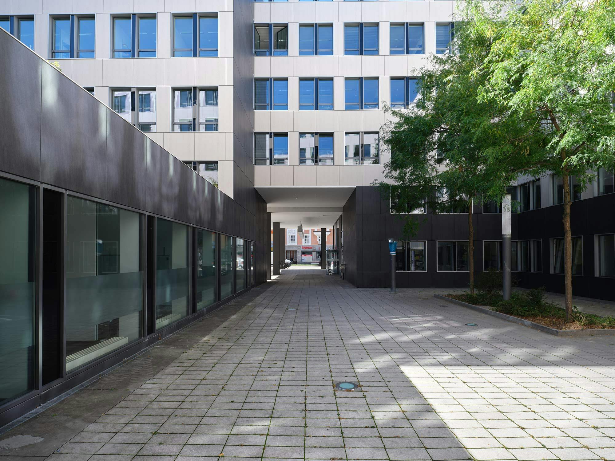Image 45 of Fachada office building Munich.jpg?auto=format%2Ccompress&ixlib=php 3.3 in The Fenix office building in Stockholm, where the Dekton façade preserves the original structure and the characteristic industrial heritage - Cosentino