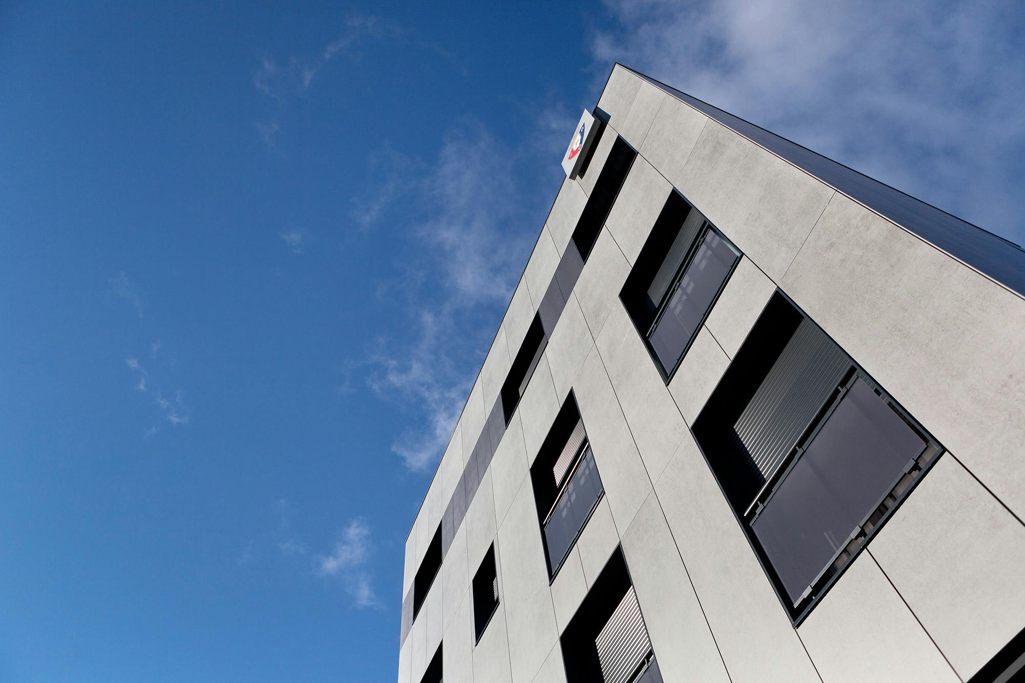 Image of Edificio Estella 1.jpg?auto=format%2Ccompress&ixlib=php 3.3 in {{An industrial style façade with Dekton’s sturdy character}} - Cosentino