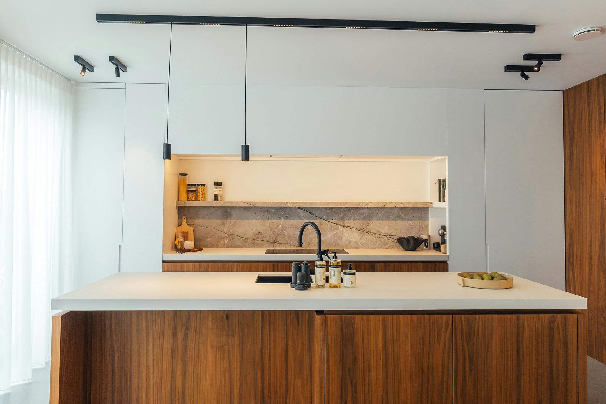 Image 45 of Droika Engelen.jpg?auto=format%2Ccompress&ixlib=php 3.3 in Dekton Arga creates an elegant atmosphere in this open plan kitchen with a minimalist approach - Cosentino