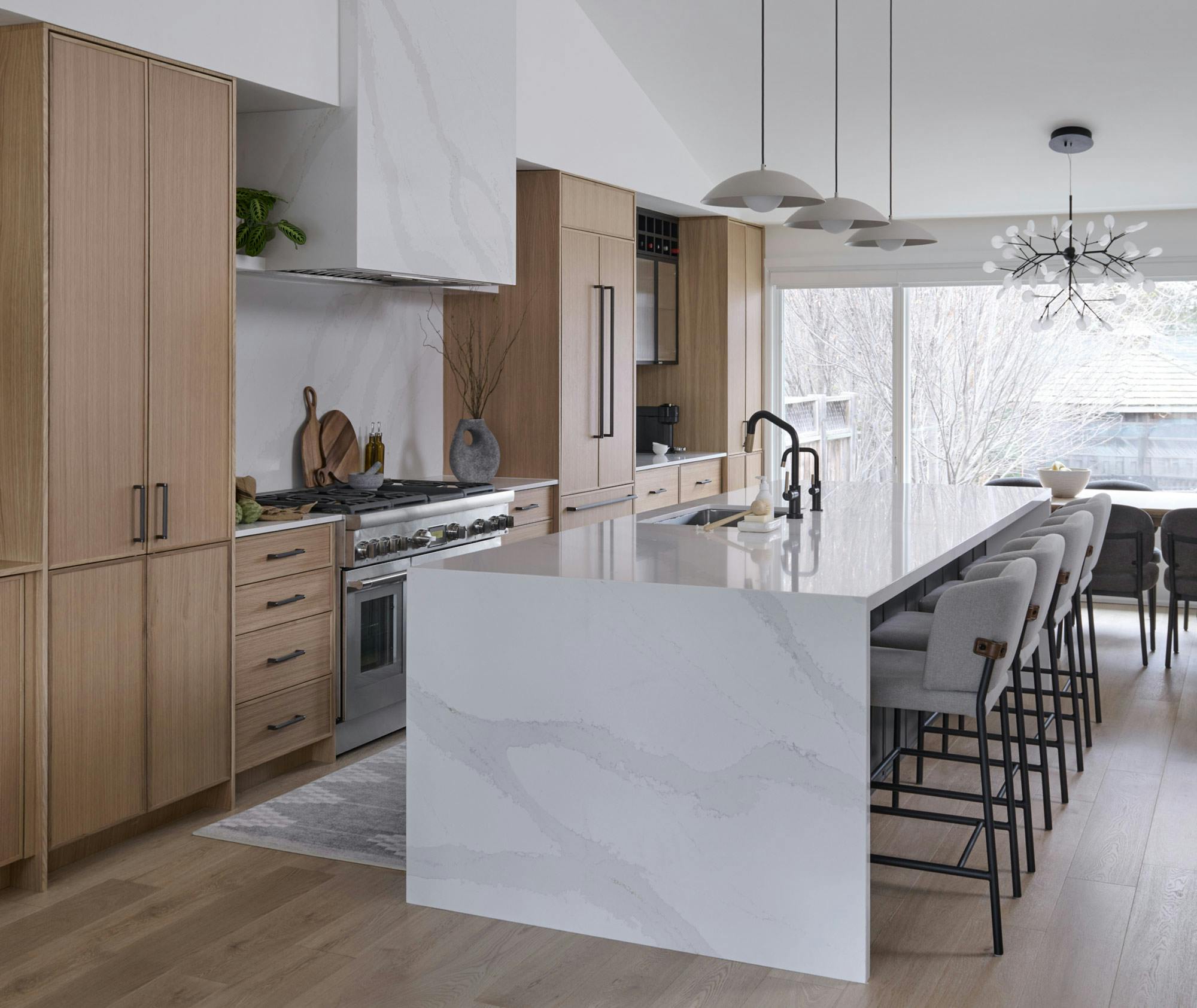 Image 42 of Fletcher 6.jpg?auto=format%2Ccompress&ixlib=php 3.3 in A living room / kitchen with modern and luxurious elegance thanks to Dekton Lucid - Cosentino