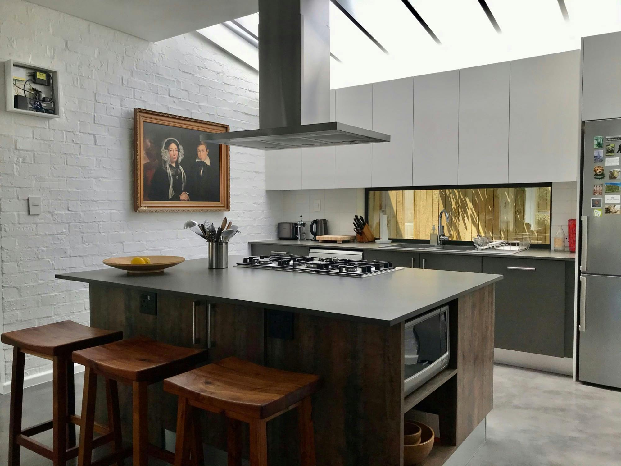 Image of Kitchen island.jpg?auto=format%2Ccompress&ixlib=php 3.3 in Cosentino clads the interior of a flat located in one of the most avant-garde biophilic districts in the world - Cosentino