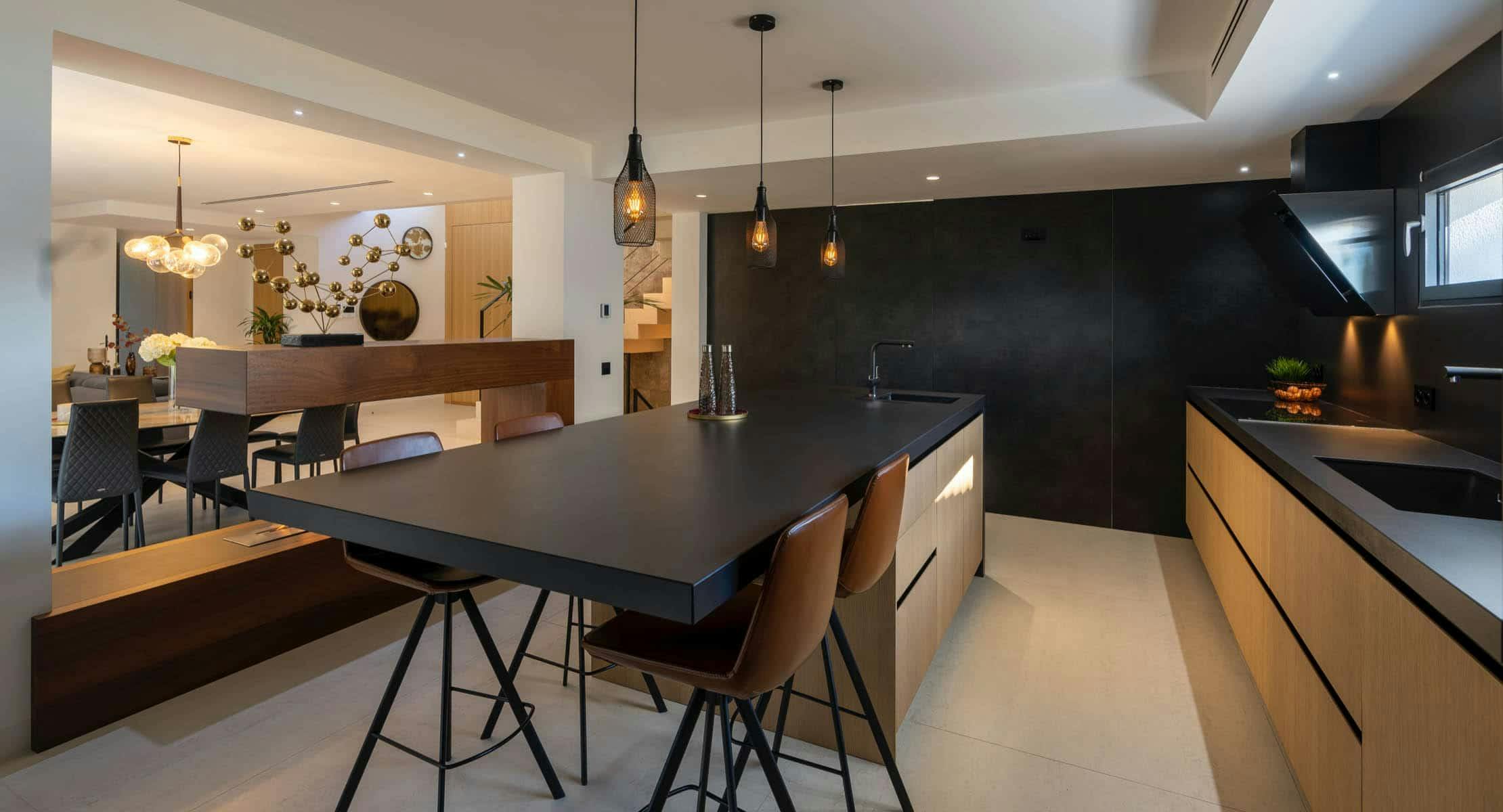Image number 33 of the current section of Kitchen table and wall cladding in the same material in Cosentino Australia