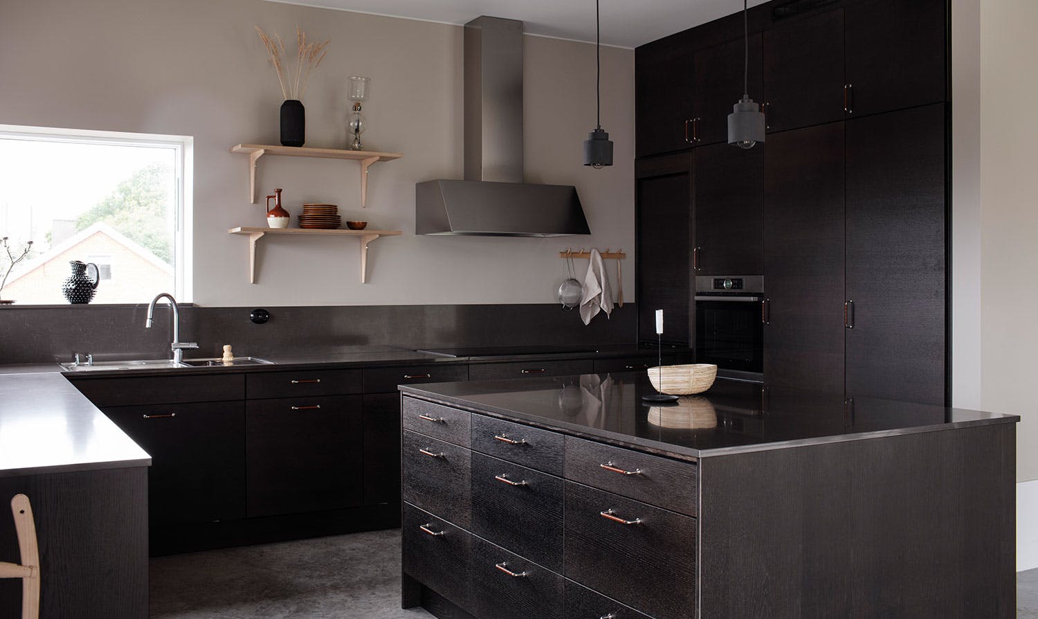 Image number 32 of the current section of A dark-brown Scandinavian kitchen is cosy year-round in Cosentino Australia