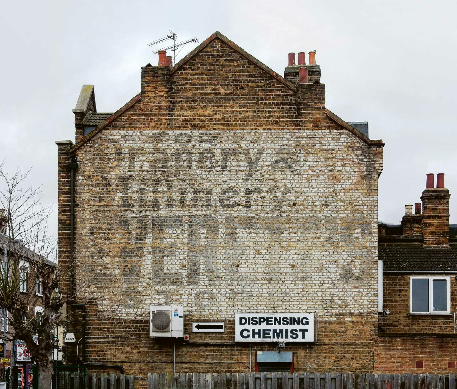 Image number 33 of the current section of Ghost Signs. A London Story in Cosentino Australia