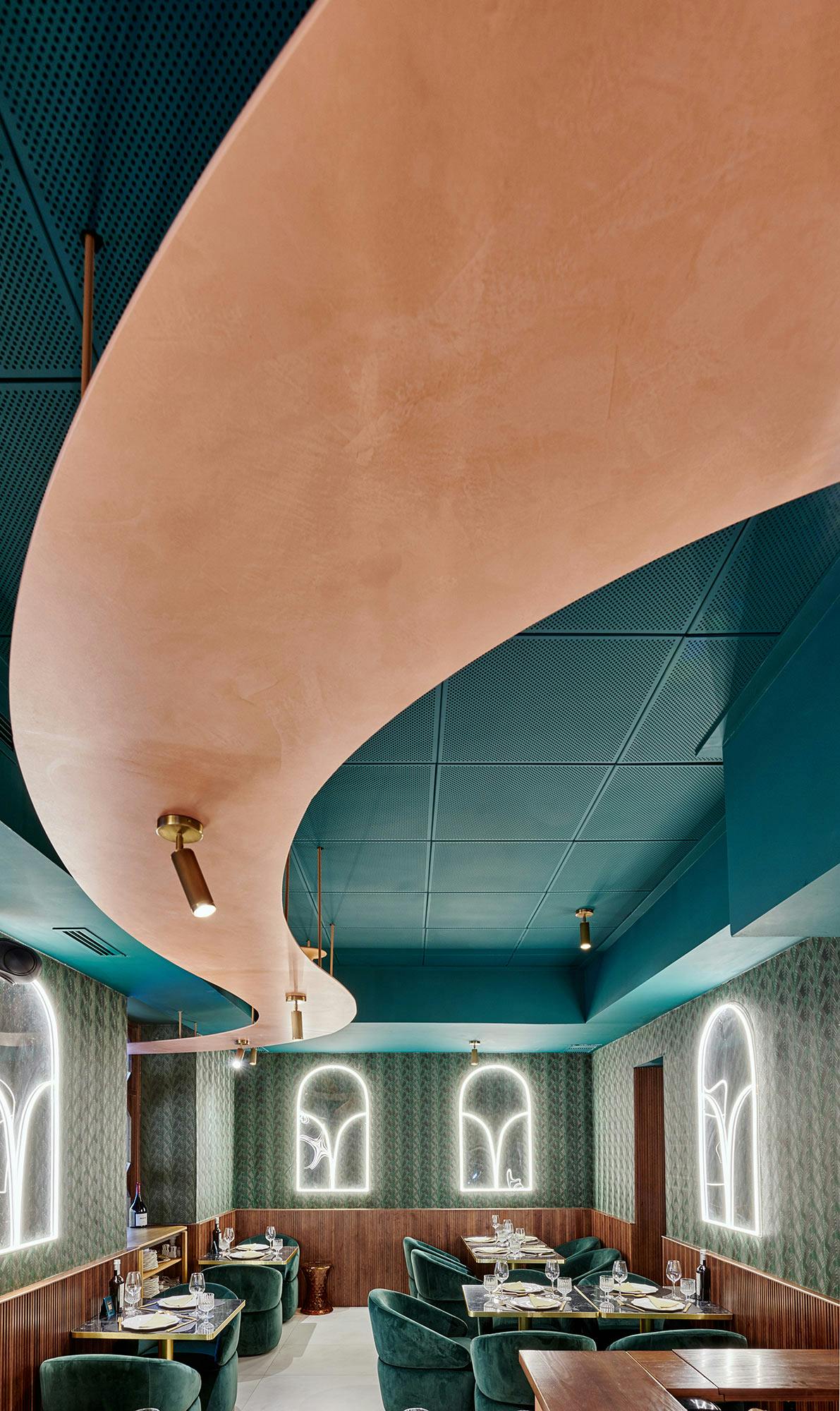 Image number 38 of the current section of Dekton gives character to the bar and the organically shaped ceiling of this unique restaurant in Valencia in Cosentino Australia