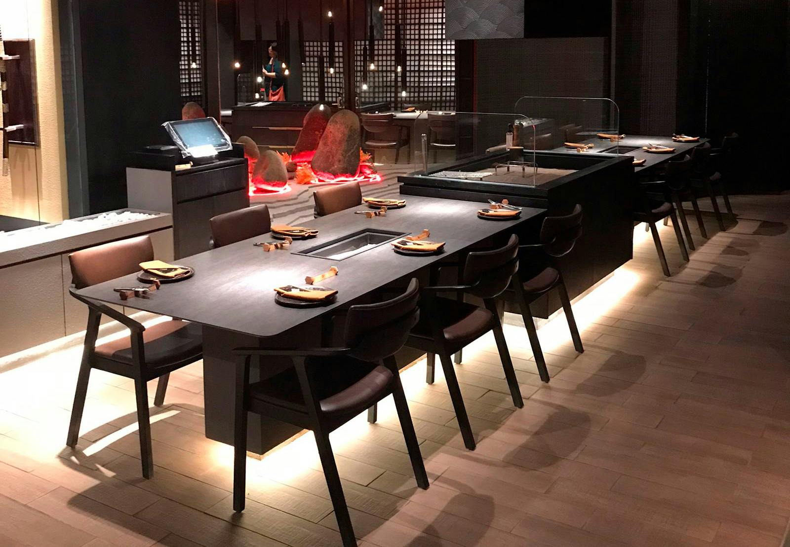 Image number 32 of the current section of Dekton Bromo, the perfect hard-wearing solution for the tables of an Irori-style Japanese restaurant in the city of Jakarta in Cosentino Australia