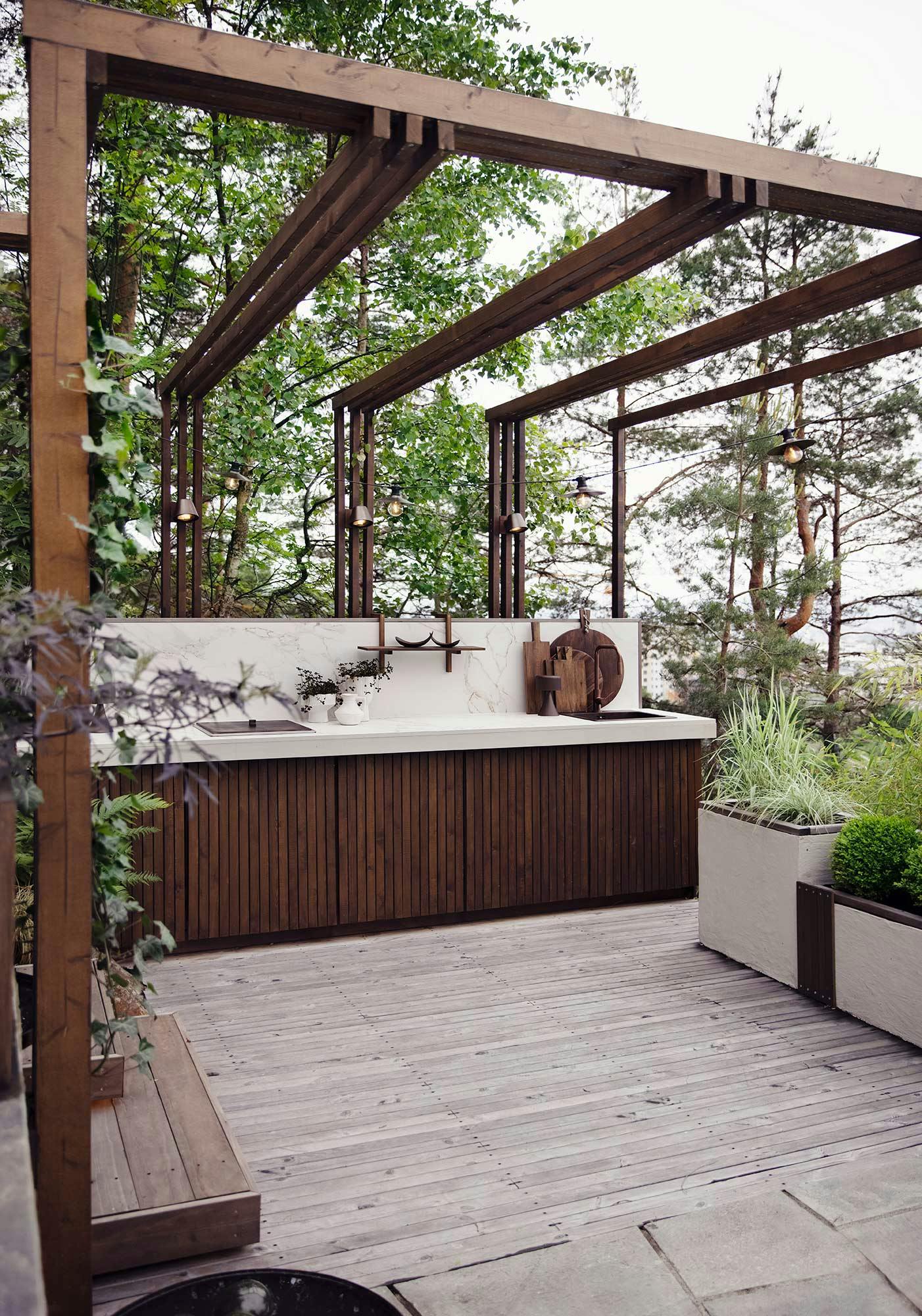 Image number 92 of the current section of Dekton is part of a lovely outdoor kitchen in Norway thanks to its exceptional durability and resistance in Cosentino Canada