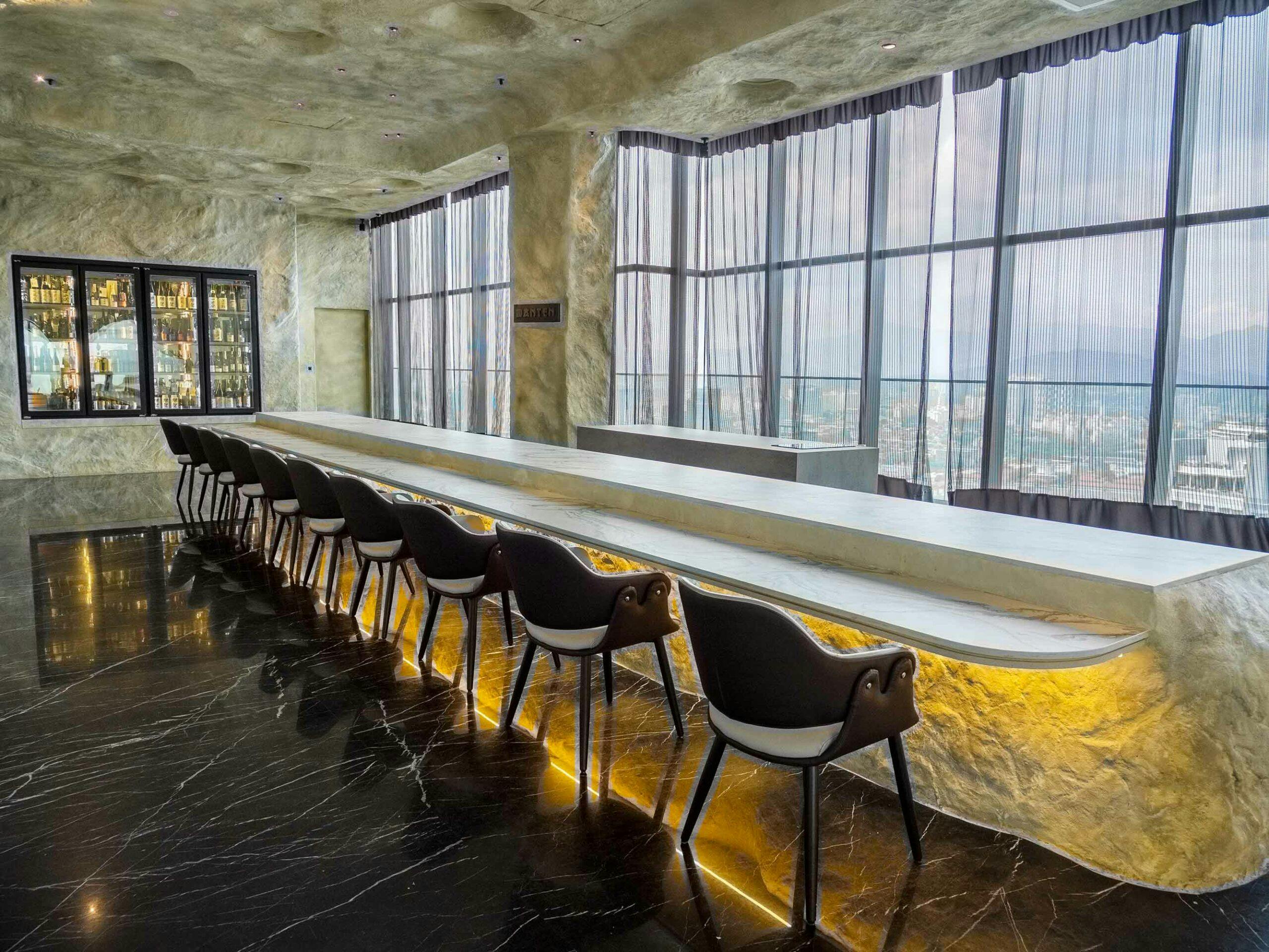 Image number 32 of the current section of The dreamlike shade of Dekton Liquid Sky stands like a sculpture in a unique restaurant overlooking the Kuala Lumpur skyline in Cosentino Canada