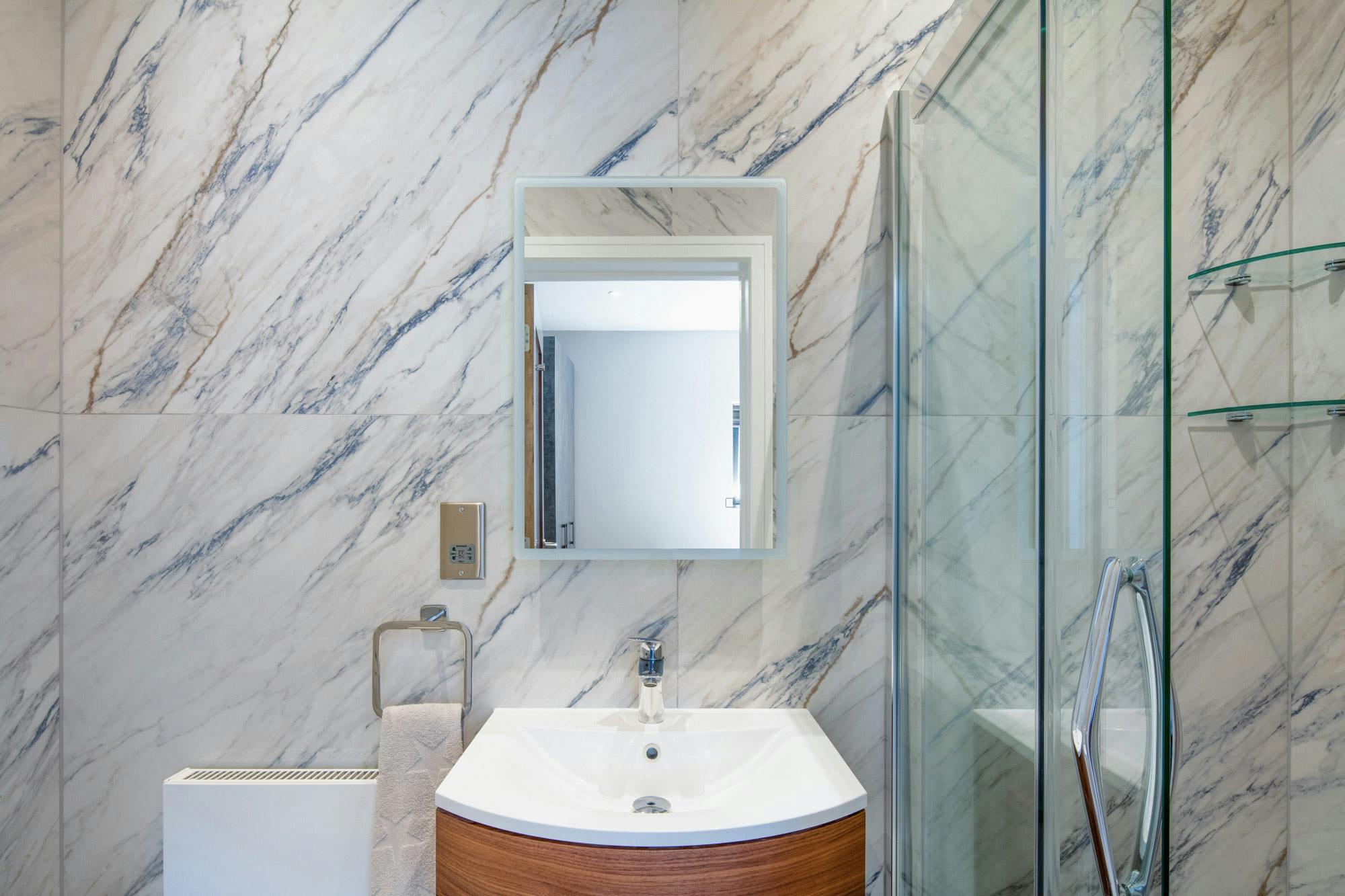 Image number 35 of the current section of Two full-fledged bathrooms covered by Dekton at Ben Adams in Cosentino Canada