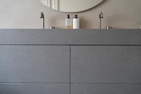 Studio Costa Molinos turns to Dekton for the innovative vanity unit in the home of French influencers J’aime tout chez toi