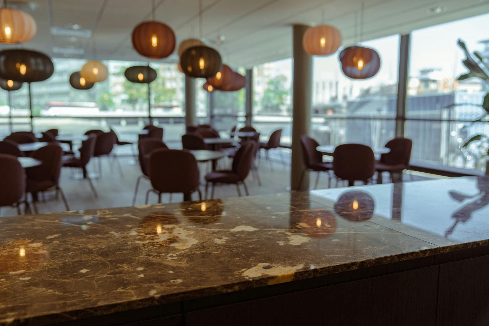 Image number 32 of the current section of Scalea brings a touch of elegance to the bar area of a professional office in Cosentino Ireland