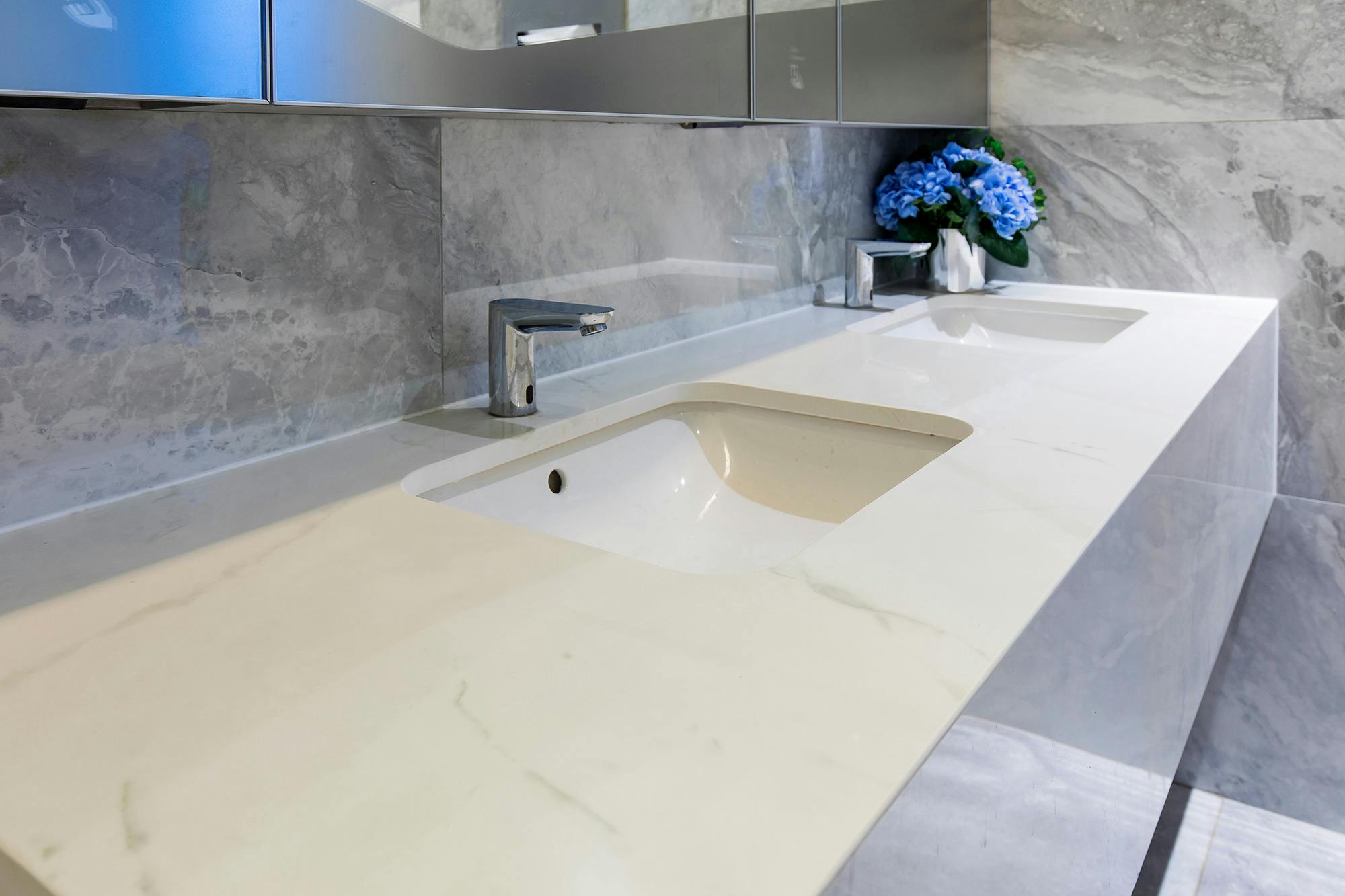 Image of bathroom cape royal.jpg?auto=format%2Ccompress&ixlib=php 3.3 in Dekton adds a new touch of elegance to the reception area of a luxury development in Singapore - Cosentino