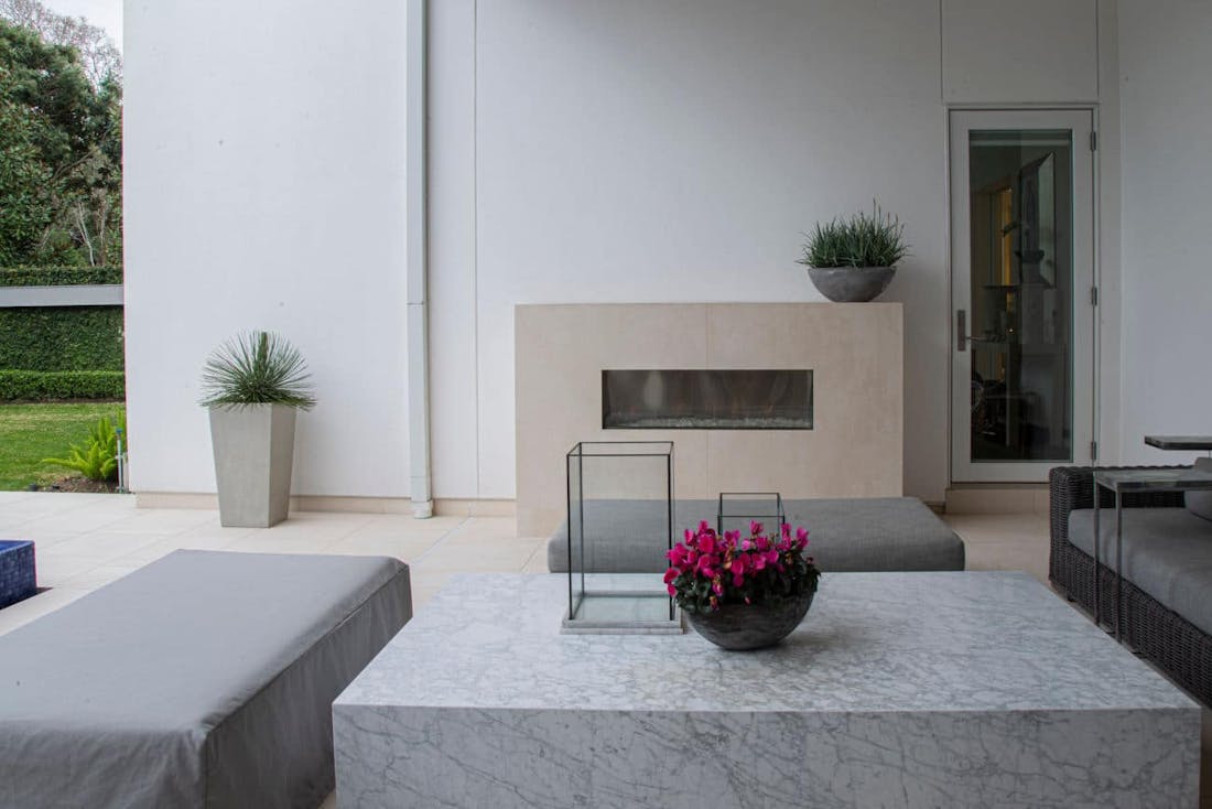 Image of Dekton Danae Fireplace residential Leiva3.jpg?auto=format%2Ccompress&fit=crop&ixlib=php 3.3 in The welcoming warmth of home that only a fireplace can offer - Cosentino