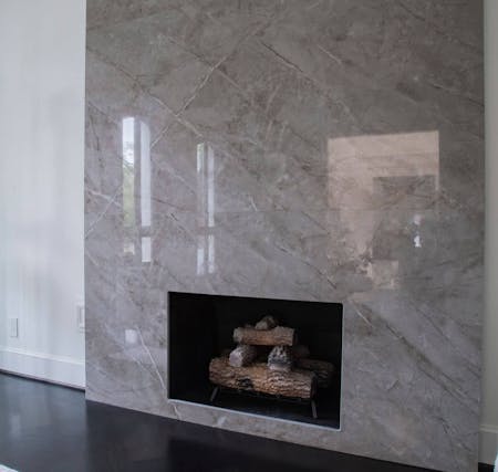 Image of Houston Show House Fireplace Dekton Stonika Sogne 2.jpg?auto=format%2Ccompress&fit=crop&ixlib=php 3.3 in The welcoming warmth of home that only a fireplace can offer - Cosentino