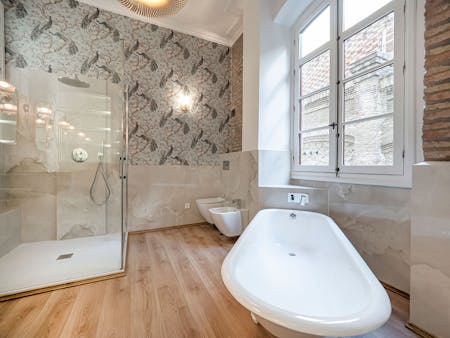 A bathroom blending in with the historic building’s past