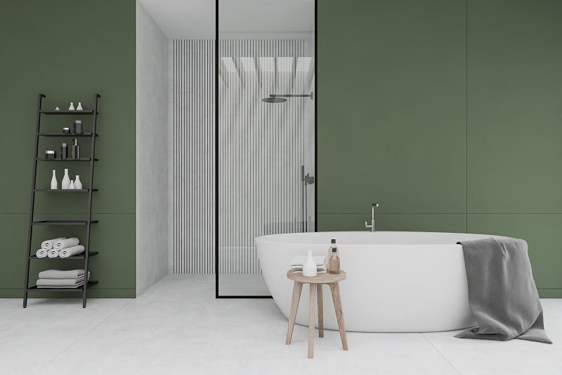 Baño verde con bañera