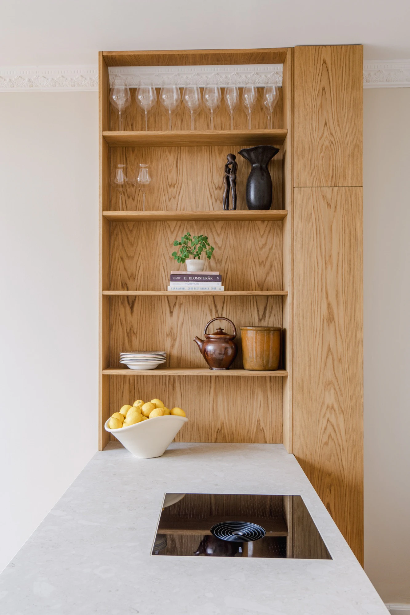 A modern, practical and discreet kitchen in a historic building in