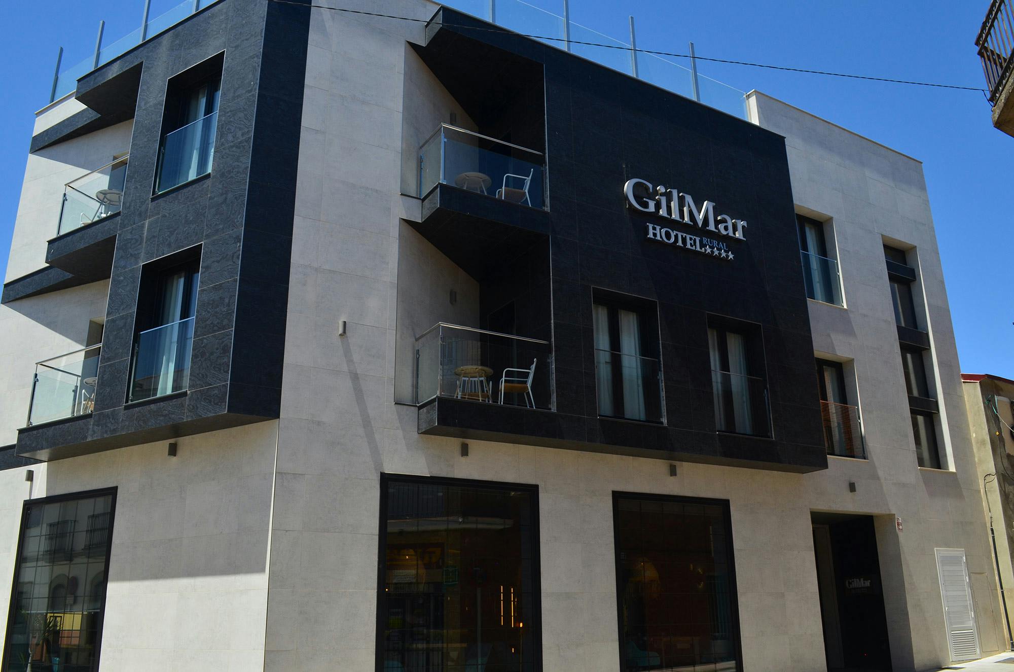 Image 36 of hotel rural gilmar fachada dekton 6.jpg?auto=format%2Ccompress&ixlib=php 3.3 in This immaculate façade conveys the values of cleanliness, professionalism and intimacy for which the clinic is renowned - Cosentino