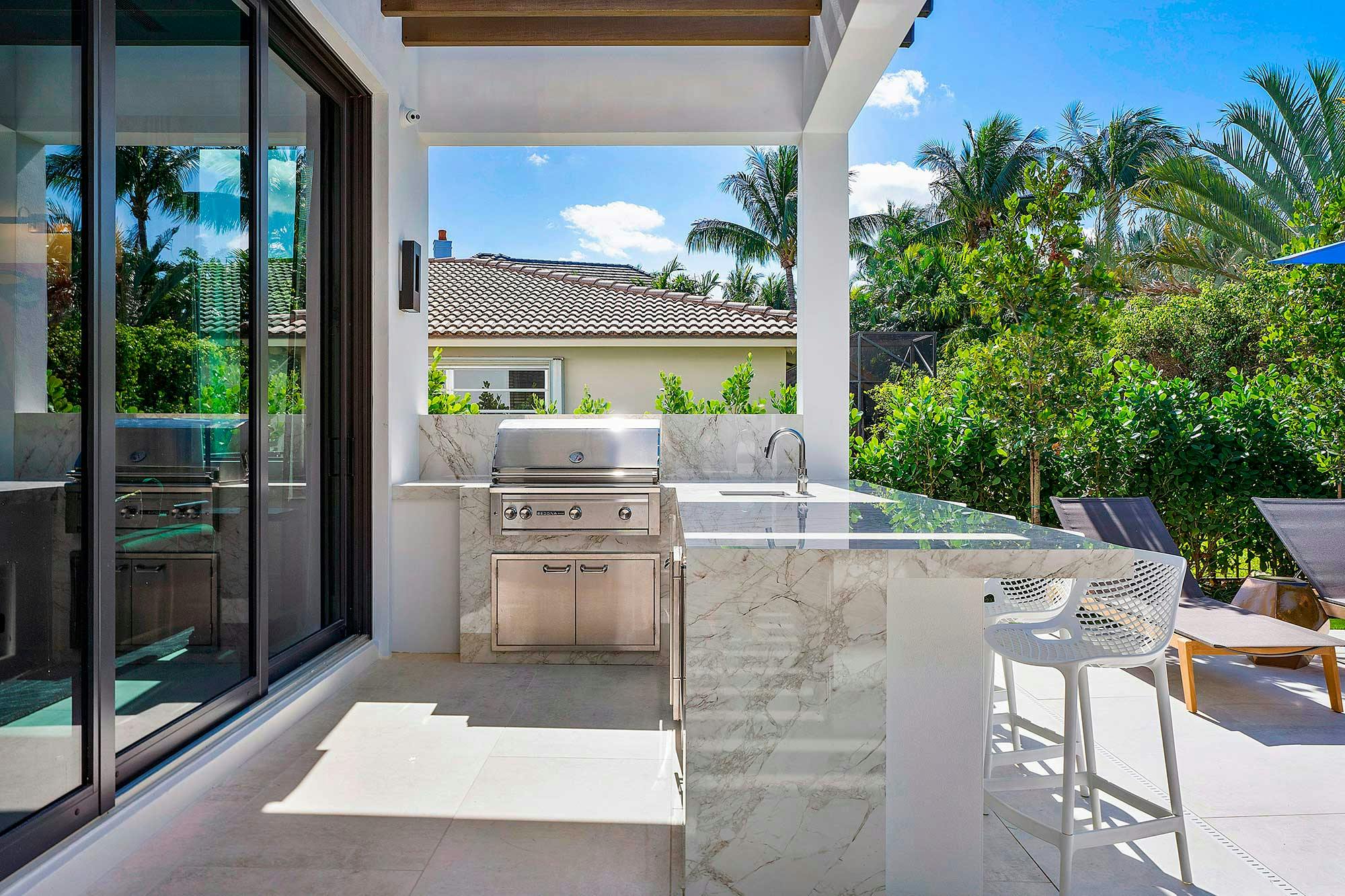 Image of 073 2379WestSilverPalmRoad BocaRaton FL 33432 FULL.jpg?auto=format%2Ccompress&ixlib=php 3.3 in Dekton for an integrated façade and outdoor kitchen in this private home in France - Cosentino