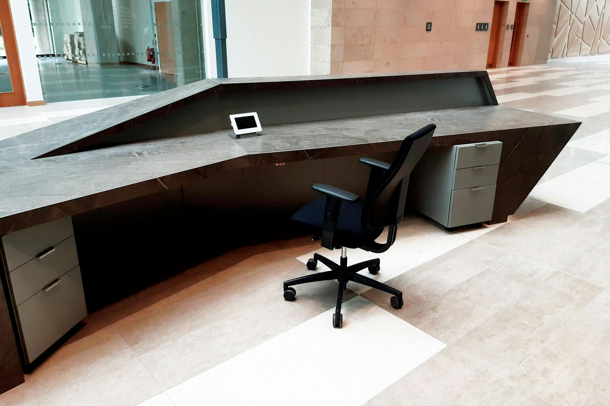 Image of Reception Desk 13 one south ed.jpg?auto=format%2Ccompress&ixlib=php 3.3 in One South County - Cosentino