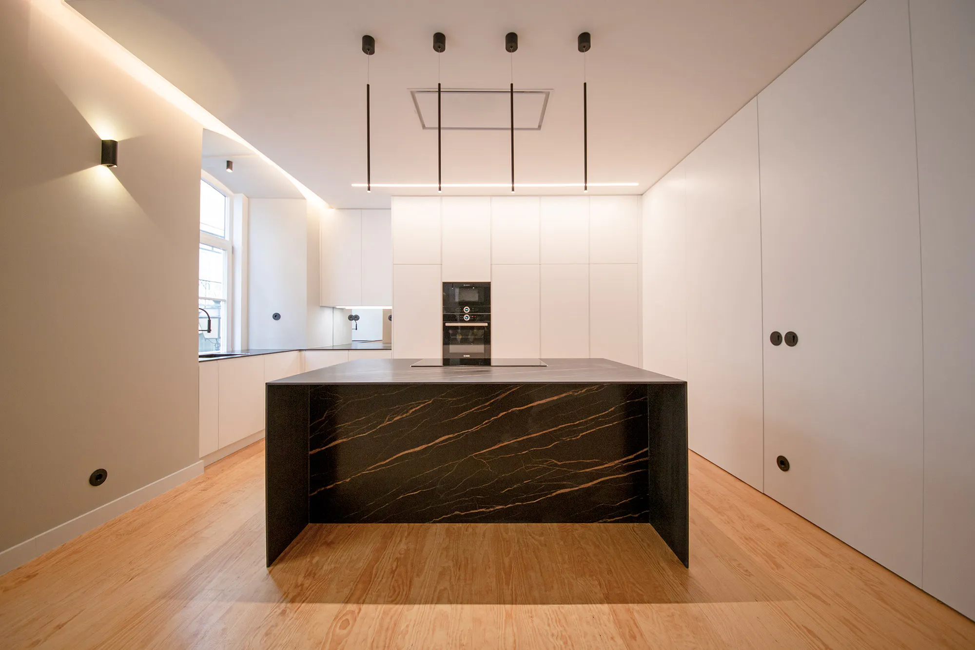 Apart-Alfama_LMR-(44) Image 36 of Apart Alfama LMR 44.jpg?auto=format%2Ccompress&ixlib=php 3.3 in Dekton Marmorio defines the architectural identity of this contemporary home - Cosentino