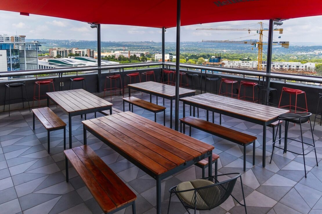 A bold rooftop bar in the heart of Rosebank enhanced by Dekton surfaces