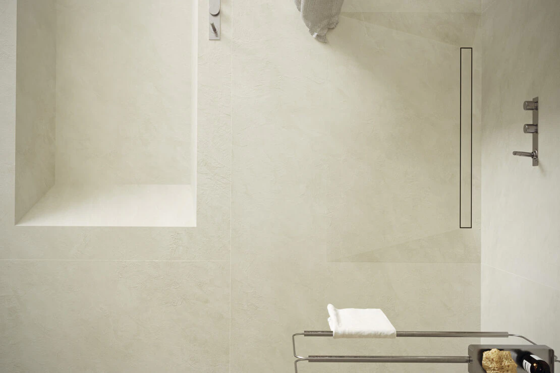 Image showcasing The Resilient House: the bathroom by MUT Design that evokes Roman baths ...