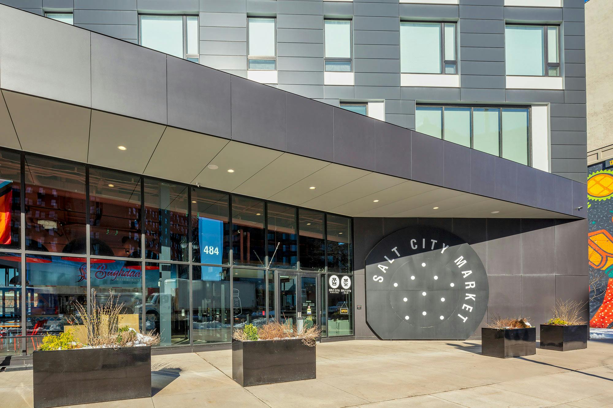 Dekton Domoos adorns the facade of the mixed-use Salt City Market ...