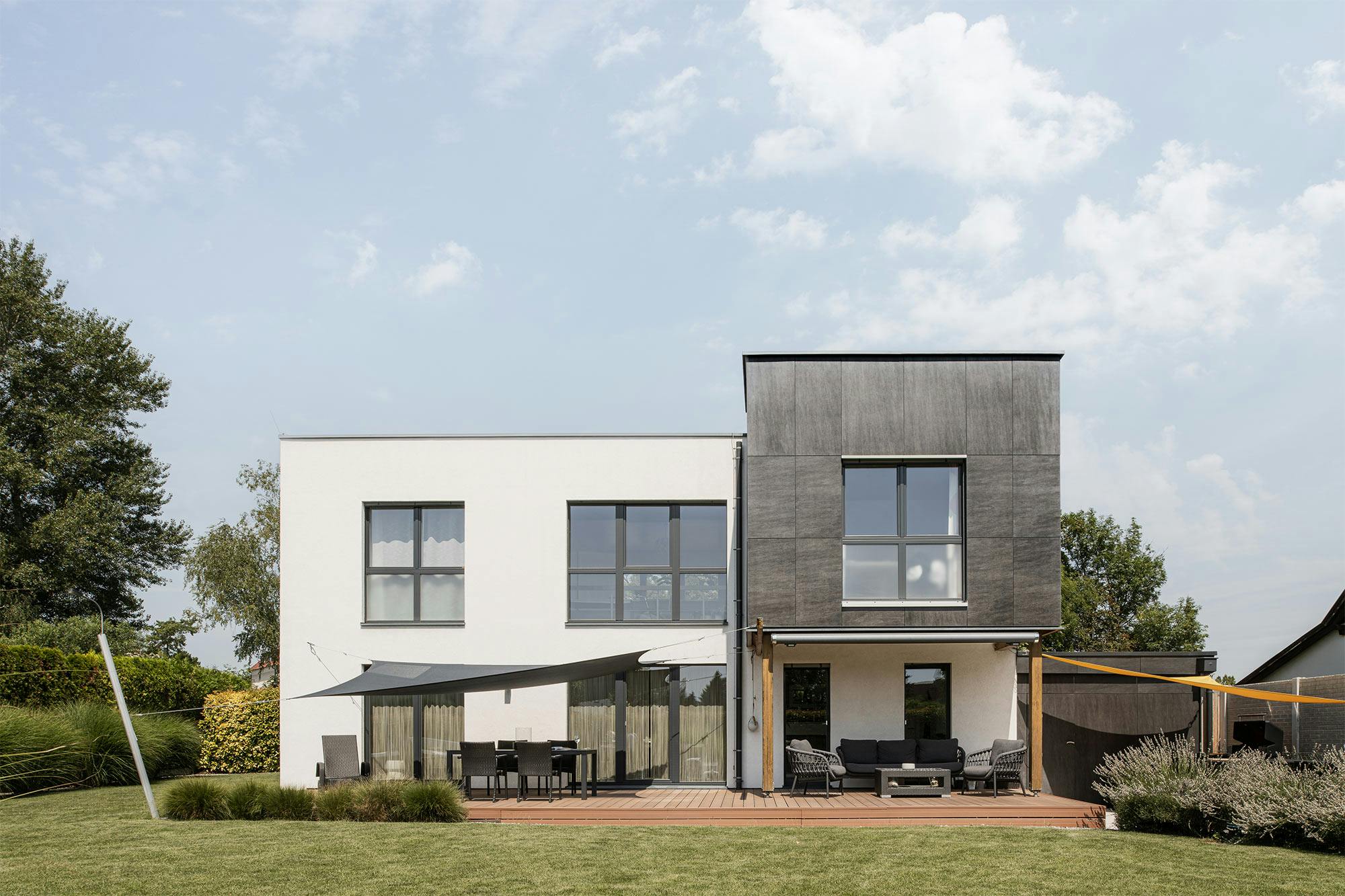 Residential-Villa-Facade-Austria-4 Image 41 of Residential Villa Facade Austria 4.jpg?auto=format%2Ccompress&ixlib=php 3.3 in A minimalist façade with Dekton as the key material - Cosentino