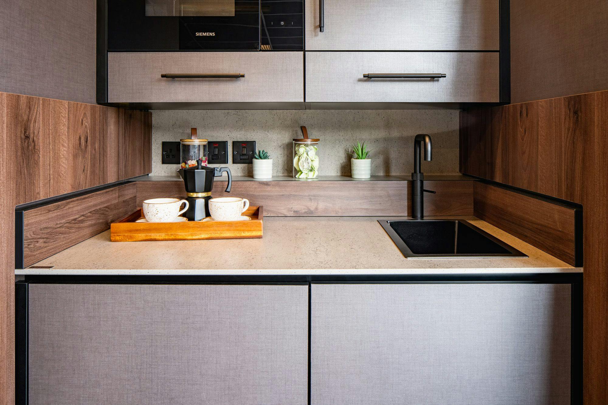 Facade KES Group (9) Image 46 of Facade KES Group 9.jpg?auto=format%2Ccompress&ixlib=php 3.3 in A sophisticated home with a Dekton worktop in the scullery: the new trend for large kitchens - Cosentino